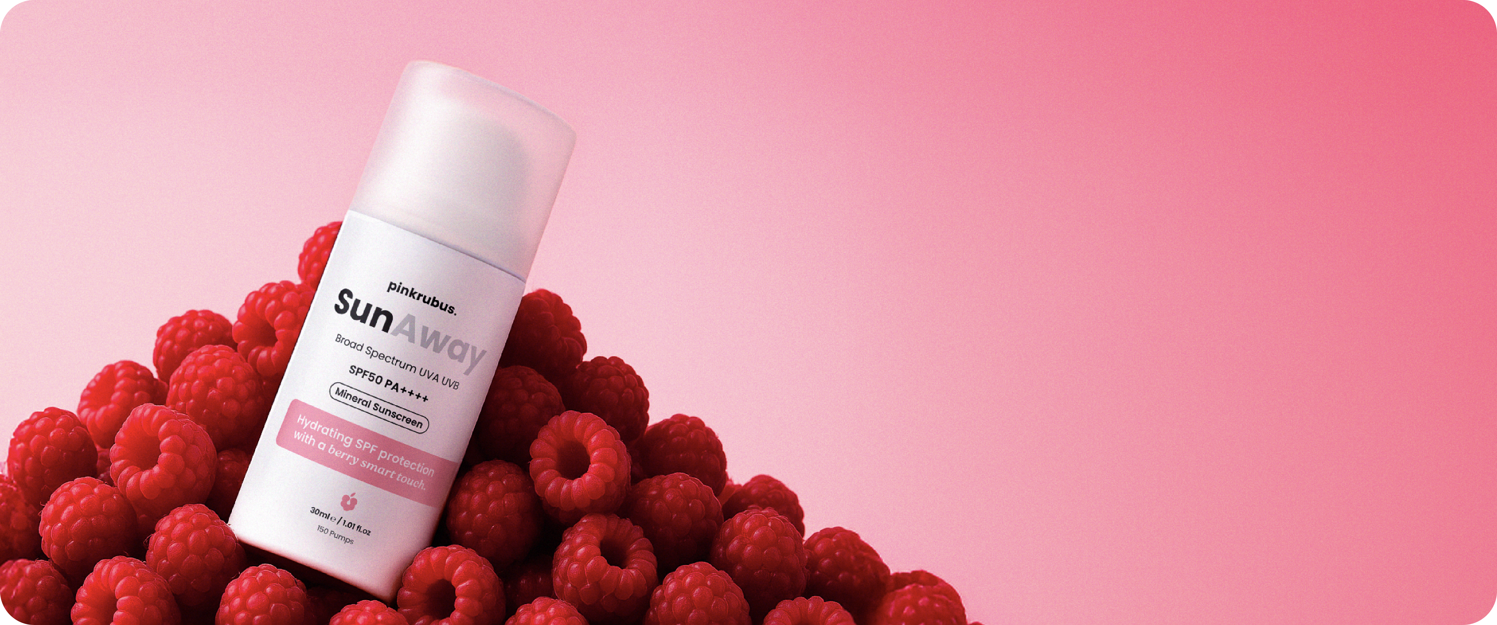 Pinkrubus SunAway mineral sunscreen bottle surrounded by fresh raspberries on a pink background, highlighting SPF50 PA++++, hydrating protection, and antioxidant-rich raspberry oil.